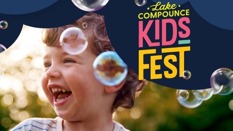 Child smiling with bubbles!