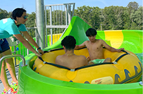 Family in front of wave pool