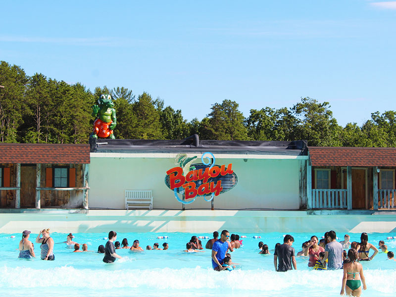 Family in front of wave pool